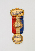 Silk, metal, paper, and celluloid ribbon badge produced for the National Star Spangled Banner Centennial, 1914, made by the Hyatt Manufacturing Company of Baltimore, Maryland. During the week of September 6-13, 1914, the city of Baltimore held a celebration of Francis Scott Key, the Star Spangled Banner, and the victory over the British during the…