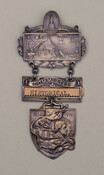 Silver, metal, and paper badge produced for the National Star Spangled Banner Centennial, 1914, made by Whitehead & Hoag Co. of Newark, New Jersey. During the week of September 6-13, 1914, the city of Baltimore held a celebration of Francis Scott Key, the Star Spangled Banner, and the victory over the British during the Battle…