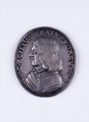 Silver medal featuring (front) Lord Cecil Calvert, 2nd Baron of Baltimore (1605-1675), 1632, made in Great Britain. The front text reads: "CÆCILIVS : BALTEMOREVS". The reverse features a map of Maryland, the Calvert shield crest, and reads: "VT : SOL : LVOEBIS : AMERICÆ". The reverse inscription translates from Latin to English: "As the sun…