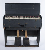 Wurlitzer Bilhorn portable folding organ that belonged to musician James Hubert "Eubie" Blake (1887-1983). Eubie Blake practiced on this folding organ in hotel rooms when he traveled. This organ may be the same one Blake's mother purchased for him as child, and which inspired his musical career.