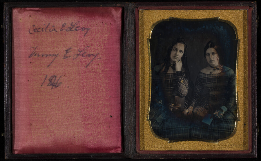 Daguerreotype portrait of Cecilia E. and Fanny E. Levy. The two are seated, wearing matching plaid dresses. Cecilia Eliza Levy (1830-1916) and Fanny Emma Levy (1831-1895) were the daughters of David Cordoza Levy of Charleston, South Carolina and Philadelphia. In 1850, Cecilia married Israel Cohen (1820-1873) of Baltimore. They were parents to: Benjamin I. (1852-1915);…