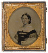 Ambrotype portrait of Kate Butler Lucas White (1840-1920), daughter of Edward Carrell Lucas (1811-1872) and Catherine "Kate" A. Meline (1818-1897), and granddaughter of cartographer, artist, and publisher Fielding Lucas Jr. (1781-1854). In 1865, she married Thomas Hurley White (1837-1902), a sugar refiner in Baltimore. The couple were parents to Edward Lucas (1866-1934) and Ethel (1868-1955).