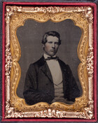 Tintype portrait of Greenberry "Green" Griffith Waters, son of H.W. Dorsey Waters and Prudence Jane Griffith. Waters died while in prison at Ft. McHenry in Baltimore, Maryland, having been captured as a cavalryman in Gus Dorsey's 1st Virginia Regiment near the close of the Civil War. He was 23 years old at his time of…