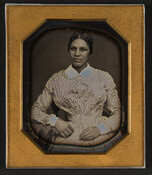 A cased daguerreotype portrait of Martha Ann "Patty" Atavis (circa 1816-1874). Atavis was an enslaved person in the home of Dr. John Whitridge of Baltimore, Maryland. On the inside of the case is a handwritten note that reads: "Martha Ann Atavis / generally known as "Patty" / Died February 26th, 1874 / 58 years old…