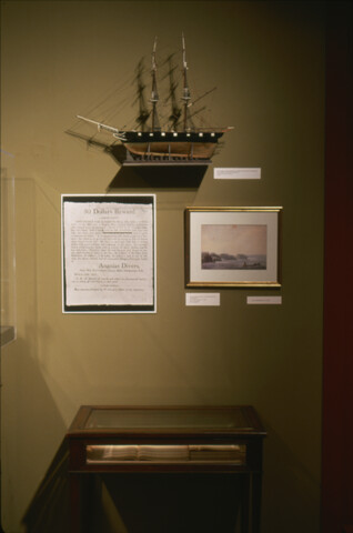 Mining the Museum: Model of Baltimore Clipper, reward broadside, and watercolor painting — 1992-1993