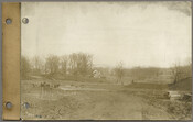 View looking northeast from the north side of East University Parkway towards the confluence of Greenway (at left) and Chancery Road (at right) during the Roland Park Company’s development of the Guilford neighborhood in Baltimore, Maryland.