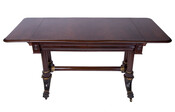 Baltimore Empire sofa or library table with drop leaves. Original to Laurel Hill, a house near Natchez, Mississippi, owned by Dr. William Newton Mercer (1792-1878), who was born in Maryland. Owner of the table may have been Mrs. E. Young of Natchez.