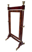 Full-length freestanding dressing mirror with mahogany frame, waterleaf carved legs with brass scroll feet. Baltimore architect James Bosley Noel Wyatt (1847-1926) believed the cheval glass had been originally placed in the Fayette Street house of his aunt Elizabeth Noel (1797-1851) and her husband, James Bosley (c. 1779-1843). His parents, Margaret Noel (1812-1897) and William Edward…