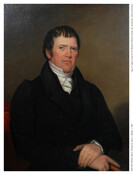 Half-length portrait of Mr. Michael Warner by James L. Wattles. Warner appears as a middle-aged man with short brown hair. He wears a black coat with a white stock. His hands are crossed in his lap as he holds a book in his right hand.
