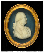 Bust-length profile wax relief of George Washington (1732-1799). Cameo sits in a gold oval-shaped frame over a deep blue background.
