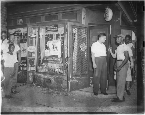 Group outside of liquor store — 1948-07
