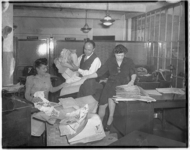 Group of people working in the <em>Afro-American</em> newspaper office — undated