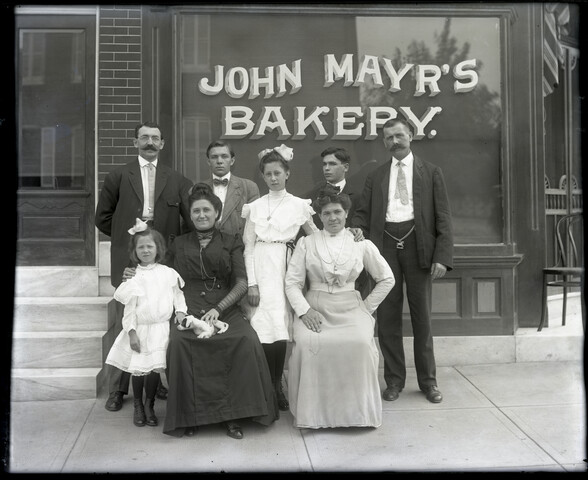 Group portrait in front of John Mayr’s Bakery — 1909-09-12