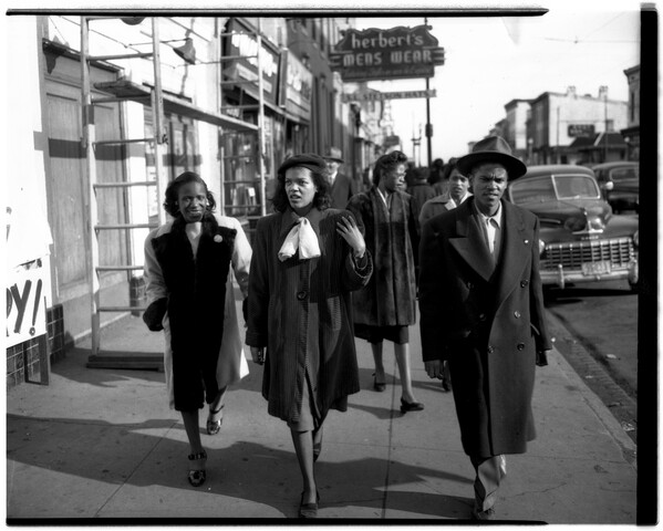 Pedestrians walking on Pennsylvania Avenue — 1948-03