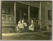 Baltimore, Maryland, photographer Emily Spencer Hayden's daughter Ruth (center) with friends Anna Mullikin (left) and Jean Fulton (right) at the side porch of the Hayden family home known as "Nancy's Fancy." Verso transcription: Anna Mullikin, Ruth Hayden and Jean Fulton side porch, Nancy's Fancy