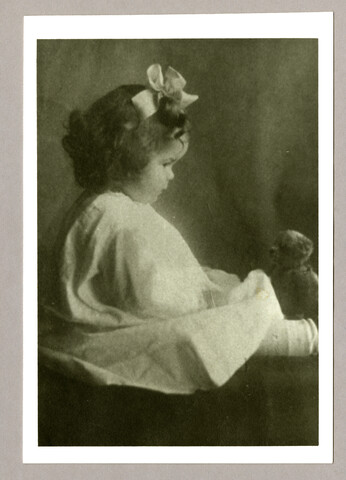 Portrait of Anna Bradford Hayden seated before a teddy bear — circa 1905