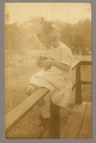 Anna Bradford Hayden peering into camera — circa 1912