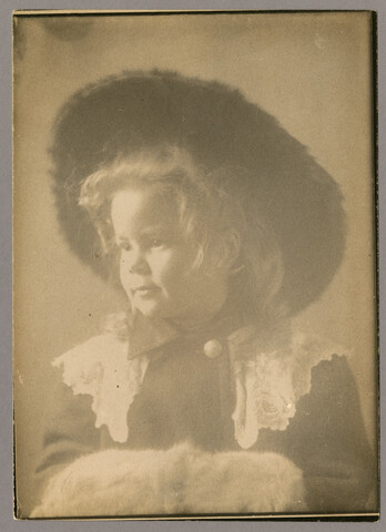 Portrait of Anna Bradford Hayden wearing hat and muff — circa 1910