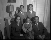 Group portrait of the Mitchell family, including Juanita Jackson Mitchell, Michael Mitchell, Clarence Mitchell, Kieffer Mitchell, and Clarence Mitchell, III.