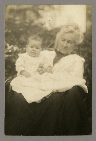 Portrait of Georgianna Swett Hayden holding a child — undated