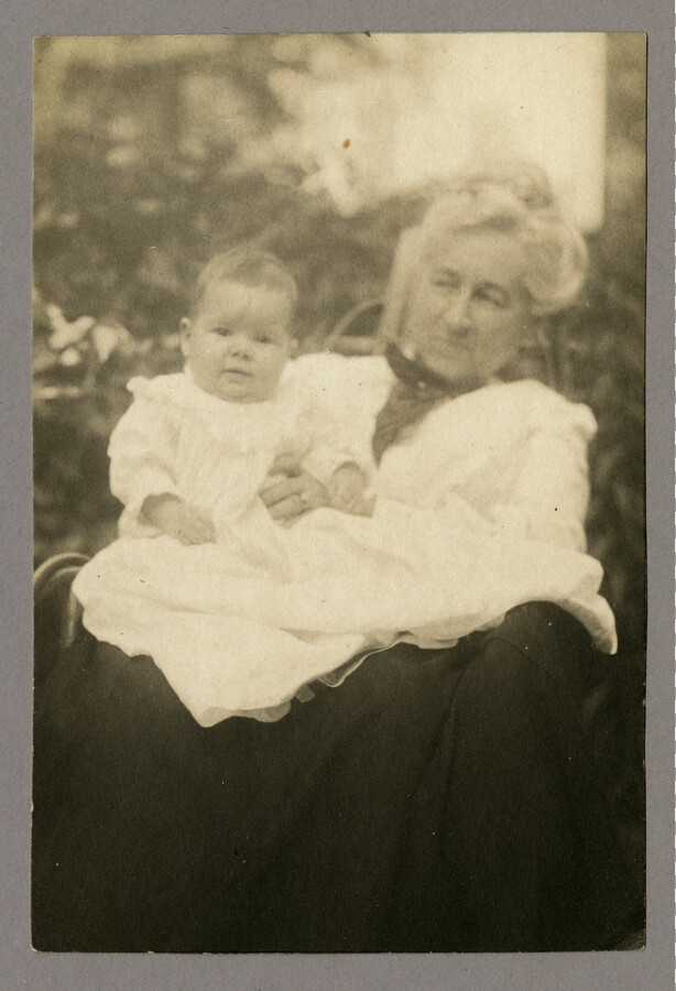 Portrait of the Baltimore, Maryland, photographer Emily Spencer Hayden's mother-in-law Georgianna Swett Hayden holding and unidentified child. Verso transcription: Georgia Anna Swett Hayden. Mother of Charles Hayden