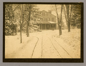 A view of the snow-covered home of photographer Emily Spencer Hayden located in Catonsville, Maryland. Verso transcription: Catonsville. Home of E.H.H.