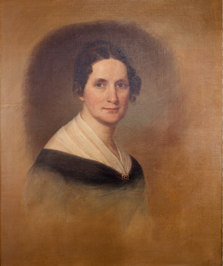 Unfinished half-length portrait of Rebecca Pue Dobbin (1812-1884). She wears a white fichu, black dress, and a brooch with her hair arranged in ringlets. She was the wife of Judge George Washington Dobbin (1809-1891).
