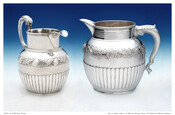 Pair of silver pitchers formerly belonging to Elizabeth Patterson Bonaparte's (1785-1879) mother, Dorcas Spear Patterson (1761-1814). Both pitchers are scalloped on the bottom half with fruit and leaf motif band around middle. Banded rims and leaf on handle.