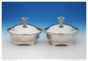 Pair of lidded silver vegetable dishes with crown finials. Engraved with Bonaparte coat of arms. Made in Baltimore, Maryland by Samuel Kirk & Son.