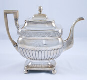 Silver coffee pot made by Hosea Wilson & Co., Baltimore, Maryland. Letter "T" engraved on pot.