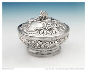 Covered sugar dish (pair), 1835-1846, with Bonaparte family crest, made by Baltimore's Samuel Kirk & Son. This is the only example of répoussé silver in the Maryland Historical Society's collection with the engraved Bonaparte arms and an unusual rabbit finial.