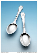 Pair of silver dessert spoons with round basins. Handles engraved with initials "E" and "EP."