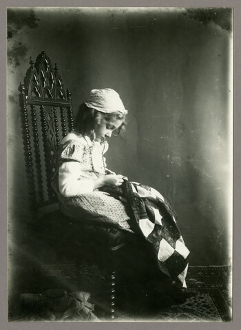 Portrait of Mary Owen sewing — circa 1915