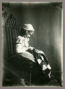A seated portrait of Mary Owen sewing. Mary was a friend of Ruth Hayden, the daughter on the Baltimore, Maryland, photographer Emily Spencer Hayden.