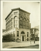 A view of the main office of the Drovers and Mechanics National Bank located on the northwest corner of Eutaw and Fayette Street, Baltimore, Maryland. Chartered in 1881, the bank was organized and had its headquarters in Maryland. Joseph Sperry Evans (1854-1930) was the architect of the building which was constructed in 1894. From 1960-2020,…