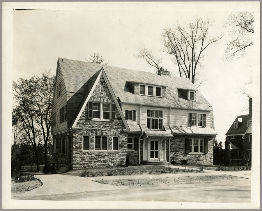 A view of a three-story house, possibly located in the Guilford neighborhood of North Baltimore, Maryland.