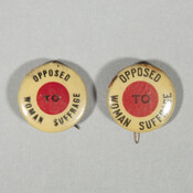 Two small "Opposed to Woman Suffrage" political buttons. The Maryland Association Opposed to Woman Suffrage (AOWS) was one of the largest anti-suffrage organizations in the country. Originally established as the "Baltimore" AOWS on January 4, 1911, the quickly expanded and changed the name to become the Maryland chapter on February 20. The National AOWS was…