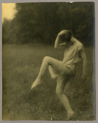 Outdoor photograph of woman dancing. From series of photographs by the Baltimore, Maryland, photographer Emily Spencer Hayden featuring students from Goucher College in which they perform a dance or play of “Cupid and Psyche.” A note on back of one of the photographs states that the women’s performance stopped traffic on Edmondson Avenue. The students…