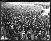Elevated view of spectators by the Pimlico Racetrack in Baltimore, Maryland.