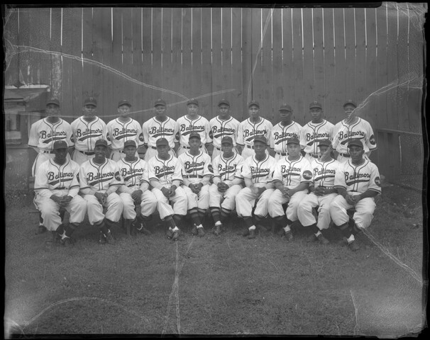 Elite Giants, Negro Leagues Baseball team group portrait on field — circa 1938-1950