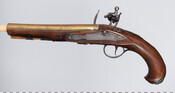 Flint-lock pistol with brass barrel made at Rappahannock Forge in Virginia. Owned by Moses Rawlings (1740-1809), a Maryland soldier who fought in the Battle of Fort Washington during the American Revolutionary War (1775-1783).
