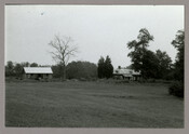 The lawn of Martin's Nest, the childhood home of the Baltimore, Maryland, photographer Emily Spencer Hayden. Verso transcription: 1984 - The Martin's Nest. Where the family lived after the wedding, where the Spencer children were born and before that where the 200 blue letters were written from Edmond to Braddie. Eliza loved the place, lived…