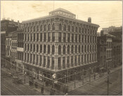 View of the Baltimore Sun Building, also known as the Sun Iron Building, which once stood at the corner of Baltimore Street and South Street in Baltimore, Maryland. R. C. Hatfield and James Bogardus built and designed the building in 1851 as the first building in the world to incorporate cast-iron columns and beams in…