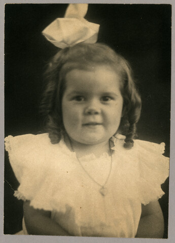 Portrait of Anna ‘Nan’ Bradford Hayden (Agle) with bow — undated