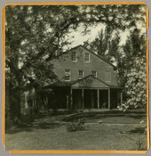 A porch-front view of Nancy’s Fancy, the home of the Baltimore, Maryland, photographer Emily Spencer Hayden. Verso transcription: Nancy's Fancy