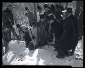 A group of men and a groundhog in the snow on Groundhog Day at Slumbering Groundhog Lodge in Quarryville, Pennsylvania.
